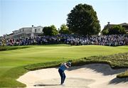 29 September 2023; Shane Lowry of Europe plays his second shot from a bunker on the 11th fairway during the morning foursomes matches on day one of the 2023 Ryder Cup at Marco Simone Golf and Country Club in Rome, Italy. Photo by Ramsey Cardy/Sportsfile