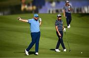 29 September 2023; Shane Lowry of Europe, left, and Rickie Fowler of USA on the ninth fairway during the morning foursomes matches on day one of the 2023 Ryder Cup at Marco Simone Golf and Country Club in Rome, Italy. Photo by Ramsey Cardy/Sportsfile