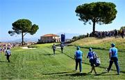 29 September 2023; Sepp Straka, right, and Shane Lowry of Europe walk to the 13th green during the morning foursomes matches on day one of the 2023 Ryder Cup at Marco Simone Golf and Country Club in Rome, Italy. Photo by Ramsey Cardy/Sportsfile