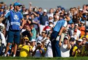 29 September 2023; Tommy Fleetwood of Europe, right, reacts after chipping onto the 10th green, watched by caddie Ian Finnis, during the morning foursomes matches on day one of the 2023 Ryder Cup at Marco Simone Golf and Country Club in Rome, Italy. Photo by Brendan Moran/Sportsfile