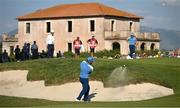 29 September 2023; Tyrrell Hatton of Europe chips out of a bunker at the 13th green during the afternoon fourball matches on day one of the 2023 Ryder Cup at Marco Simone Golf and Country Club in Rome, Italy. Photo by Brendan Moran/Sportsfile