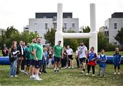29 September 2023; Ireland players Hugo Keenan, Dave Kilcoyne and James Lowe during an Ireland rugby visit to Drop Quartier Rugby ran by UST Tour Rugby in Tours, France. Photo by Harry Murphy/Sportsfile