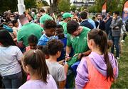 29 September 2023; Hugo Keenan signs autographs during an Ireland rugby visit to Drop Quartier Rugby ran by UST Tour Rugby in Tours, France. Photo by Harry Murphy/Sportsfile
