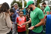 29 September 2023; Jamison Gibson-Park hands out pins during an Ireland rugby visit to Drop Quartier Rugby ran by UST Tour Rugby in Tours, France. Photo by Harry Murphy/Sportsfile