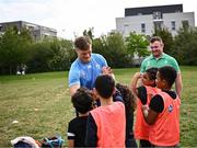 29 September 2023; Josh van der Flier and Dave Kilcoyne meet children during an Ireland rugby visit to Drop Quartier Rugby ran by UST Tour Rugby in Tours, France. Photo by Harry Murphy/Sportsfile