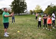 29 September 2023; Dave Kilcoyne with children during an Ireland rugby visit to Drop Quartier Rugby ran by UST Tour Rugby in Tours, France. Photo by Harry Murphy/Sportsfile