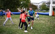 29 September 2023; Hugo Keenan with children during an Ireland rugby visit to Drop Quartier Rugby ran by UST Tour Rugby in Tours, France. Photo by Harry Murphy/Sportsfile