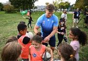 29 September 2023; Josh van der Flier signs autographs during an Ireland rugby visit to Drop Quartier Rugby ran by UST Tour Rugby in Tours, France. Photo by Harry Murphy/Sportsfile