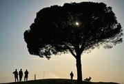 29 September 2023; Spectators enjoy the sun under a tree during the afternoon fourball matches on day one of the 2023 Ryder Cup at Marco Simone Golf and Country Club in Rome, Italy. Photo by Brendan Moran/Sportsfile