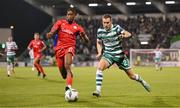 29 September 2023; Liam Burt of Shamrock Rovers in action against Euclides Cabral of Shelbourne during the SSE Airtricity Men's Premier Division match between Shamrock Rovers and Shelbourne at Tallaght Stadium in Dublin. Photo by Stephen McCarthy/Sportsfile