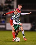 29 September 2023; Sean Kavanagh of Shamrock Rovers is tackled by Jack Moylan of Shelbourne during the SSE Airtricity Men's Premier Division match between Shamrock Rovers and Shelbourne at Tallaght Stadium in Dublin. Photo by Stephen McCarthy/Sportsfile