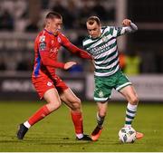 29 September 2023; Sean Kavanagh of Shamrock Rovers is tackled by Jack Moylan of Shelbourne during the SSE Airtricity Men's Premier Division match between Shamrock Rovers and Shelbourne at Tallaght Stadium in Dublin. Photo by Stephen McCarthy/Sportsfile