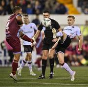 29 September 2023; Paul Doyle of Dundalk in action against Conor Kane of Drogheda United during the SSE Airtricity Men's Premier Division match between Dundalk and Drogheda United at Oriel Park in Dundalk, Louth. Photo by Ben McShane/Sportsfile