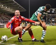 29 September 2023; Jack Moylan of Shelbourne in action against Roberto Lopes of Shamrock Rovers during the SSE Airtricity Men's Premier Division match between Shamrock Rovers and Shelbourne at Tallaght Stadium in Dublin. Photo by Stephen McCarthy/Sportsfile