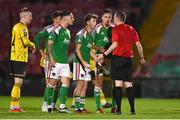 29 September 2023; Cork City players protest to referee Oliver Moran after John O'Donovan of Cork City is shown a red card during the SSE Airtricity Men's Premier Division match between Cork City and St Patrick's Athletic at Turner's Cross in Cork. Photo by Eóin Noonan/Sportsfile