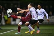 29 September 2023; Dayle Rooney of Drogheda United in action against Robbie Benson, 8, and Sam Durrant of Dundalk during the SSE Airtricity Men's Premier Division match between Dundalk and Drogheda United at Oriel Park in Dundalk, Louth. Photo by Ben McShane/Sportsfile
