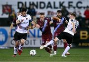 29 September 2023; Matthew O'Brien of Drogheda United in action against Patrick Hoban, left, and Paul Doyle of Dundalk during the SSE Airtricity Men's Premier Division match between Dundalk and Drogheda United at Oriel Park in Dundalk, Louth. Photo by Ben McShane/Sportsfile