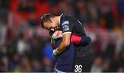 29 September 2023; St Patrick's Athletic goalkeeper Dean Lyness celebrates with a supporter after the SSE Airtricity Men's Premier Division match between Cork City and St Patrick's Athletic at Turner's Cross in Cork. Photo by Eóin Noonan/Sportsfile