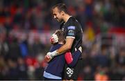 29 September 2023; St Patrick's Athletic goalkeeper Dean Lyness celebrates with a supporter after the SSE Airtricity Men's Premier Division match between Cork City and St Patrick's Athletic at Turner's Cross in Cork. Photo by Eóin Noonan/Sportsfile