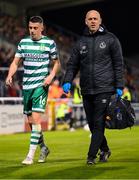 29 September 2023; Gary O'Neill of Shamrock Rovers leaves the pitch with physiotherapist Tony McCarthy during the SSE Airtricity Men's Premier Division match between Shamrock Rovers and Shelbourne at Tallaght Stadium in Dublin. Photo by Stephen McCarthy/Sportsfile