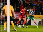 29 September 2023; Paddy Barrett of Shelbourne is tackled by Ronan Finn of Shamrock Rovers during the SSE Airtricity Men's Premier Division match between Shamrock Rovers and Shelbourne at Tallaght Stadium in Dublin. Photo by Stephen McCarthy/Sportsfile