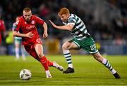 29 September 2023; Rory Gaffney of Shamrock Rovers in action against Gavin Molloy of Shelbourne during the SSE Airtricity Men's Premier Division match between Shamrock Rovers and Shelbourne at Tallaght Stadium in Dublin. Photo by Stephen McCarthy/Sportsfile