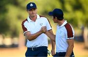 30 September 2023; Ludvig Åberg of Europe, left, celebrates with partner Viktor Hovland after making a putt on the fifth hole during the morning foursomes on day two of the 2023 Ryder Cup at Marco Simone Golf and Country Club in Rome, Italy. Photo by Ramsey Cardy/Sportsfile