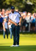 30 September 2023; Shane Lowry of Europe reactsto a missed putt on the ninth green during the morning foursomes on day two of the 2023 Ryder Cup at Marco Simone Golf and Country Club in Rome, Italy. Photo by Brendan Moran/Sportsfile