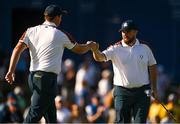 30 September 2023; Shane Lowry of Europe, right, with his partner Sepp Straka on the seventh green during the morning foursomes on day two of the 2023 Ryder Cup at Marco Simone Golf and Country Club in Rome, Italy. Photo by Brendan Moran/Sportsfile