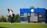 30 September 2023; Rory McIlroy of Europe putting on the 15th hole during the morning foursomes on day two of the 2023 Ryder Cup at Marco Simone Golf and Country Club in Rome, Italy. Photo by Ramsey Cardy/Sportsfile