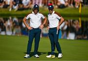 30 September 2023; Rory McIlroy, right, and partner Tommy Fleetwood of Europe on the 17th greenduring the morning foursomes on day two of the 2023 Ryder Cup at Marco Simone Golf and Country Club in Rome, Italy. Photo by Brendan Moran/Sportsfile