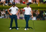 30 September 2023; Rory McIlroy, right, and partner Tommy Fleetwood of Europe on the 17th greenduring the morning foursomes on day two of the 2023 Ryder Cup at Marco Simone Golf and Country Club in Rome, Italy. Photo by Brendan Moran/Sportsfile
