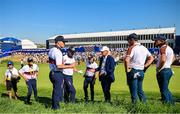 30 September 2023; Jordan Spieth and Justin Thomas of USA speak to referee Ted Antonnopolos during the morning foursomes on day two of the 2023 Ryder Cup at Marco Simone Golf and Country Club in Rome, Italy. Photo by Ramsey Cardy/Sportsfile