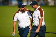30 September 2023; Shane Lowry, left, and Sepp Straka of Europe on the 16th hole during the morning foursomes on day two of the 2023 Ryder Cup at Marco Simone Golf and Country Club in Rome, Italy. Photo by Brendan Moran/Sportsfile