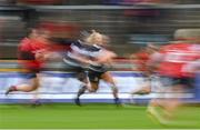 30 September 2023; Megan Gaffney of Barbarians on her way to scoring her side's fourth try during the women's representative match between Munster and Barbarians at Thomond Park in Limerick. Photo by David Fitzgerald/Sportsfile