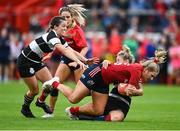 30 September 2023; Aoife Corey of Munster is tackled by Elinor Snowsill of Barbarians during the women's representative match between Munster and Barbarians at Thomond Park in Limerick. Photo by David Fitzgerald/Sportsfile