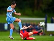 30 September 2023; Bronagh Kane of DLR Waves is tackled by Rachel Graham of Shelbourne during the SSE Airtricity Women's Premier Division match between DLR Waves FC and Shelbourne FC at UCD Bowl in Dublin. Photo by Tyler Miller/Sportsfile