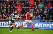 30 September 2023; Diarmuid Barron of Munster on his way to scoring his side's first try during the representative match between Munster and Barbarians at Thomond Park in Limerick. Photo by David Fitzgerald/Sportsfile