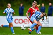 30 September 2023; Nicole Keogh of DLR Waves is tackled by Morgan Rees of Shelbourne during the SSE Airtricity Women's Premier Division match between DLR Waves FC and Shelbourne FC at UCD Bowl in Dublin. Photo by Tyler Miller/Sportsfile