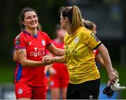 30 September 2023; Keeva Keenan of Shelbourne, left, and team-mate Amanda McQuillan celebrate after their side's victory in the SSE Airtricity Women's Premier Division match between DLR Waves FC and Shelbourne FC at UCD Bowl in Dublin. Photo by Tyler Miller/Sportsfile