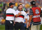 30 September 2023; Patrick Cantlay of USA celebrates with partner, Wyndham Clark, left, on the 18th green after the afternoon fourball matches on day two of the 2023 Ryder Cup at Marco Simone Golf and Country Club in Rome, Italy. Photo by Brendan Moran/Sportsfile