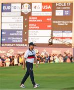 30 September 2023; USA captain Zach Johnson walks past a scoreboard on the 17th green during the afternoon fourball matches on day two of the 2023 Ryder Cup at Marco Simone Golf and Country Club in Rome, Italy. Photo by Brendan Moran/Sportsfile