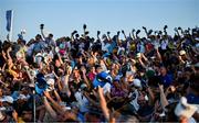 30 September 2023; Supporters cheer with their hats in the air as Patrick Cantlay of USA arrives to the 16th green during the afternoon fourball matches on day two of the 2023 Ryder Cup at Marco Simone Golf and Country Club in Rome, Italy. Photo by Brendan Moran/Sportsfile