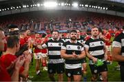 30 September 2023; Barbarians players are applauded off the field by Munster players after the representative match between Munster and Barbarians at Thomond Park in Limerick. Photo by David Fitzgerald/Sportsfile
