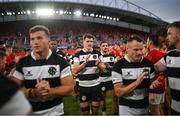 30 September 2023; Barbarians players are applauded off the field by Munster players after the representative match between Munster and Barbarians at Thomond Park in Limerick. Photo by David Fitzgerald/Sportsfile