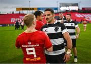 30 September 2023; Lucas Tauzin of Barbarians and Ethan Coughlan of Munster after the representative match between Munster and Barbarians at Thomond Park in Limerick. Photo by David Fitzgerald/Sportsfile