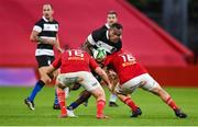 30 September 2023; Loann Goujon of Barbarians is tackled by John Ryan, right, and Niall Scannell of Munster during the representative match between Munster and Barbarians at Thomond Park in Limerick. Photo by David Fitzgerald/Sportsfile