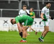 30 September 2023; Sean O'Brien of Fighting Cocks after the final whistle as Oisin Boland of St Mullins celebrates at the Carlow Junior A Football Championship final match between Fighting Cocks GAA Club and St Mullins GAA Club at Netwatch Cullen Park in Carlow. Photo by Matt Browne/Sportsfile