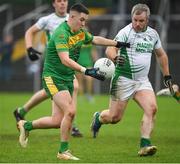 30 September 2023; Billy Nolan of Fighting Cocks in action against Thomas Coady of St Mullins during the Carlow Junior A Football Championship final match between Fighting Cocks GAA Club and St Mullins GAA Club at Netwatch Cullen Park in Carlow. Photo by Matt Browne/Sportsfile