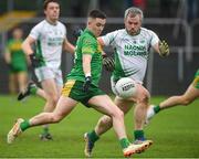 30 September 2023; Billy Nolan of Fighting Cocks in action against Thomas Coady of St Mullins during the Carlow Junior A Football Championship final match between Fighting Cocks GAA Club and St Mullins GAA Club at Netwatch Cullen Park in Carlow. Photo by Matt Browne/Sportsfile